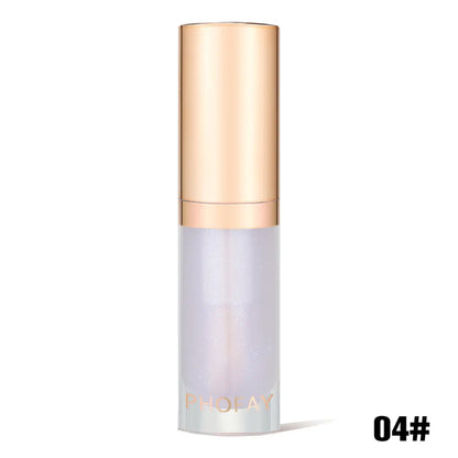 lip oil bottle with gold cap and white body on a white background