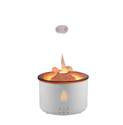 White volcano diffuser with decorative design on a gray background